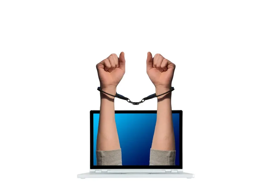 crime, handcuffs, laptop, cyber crime