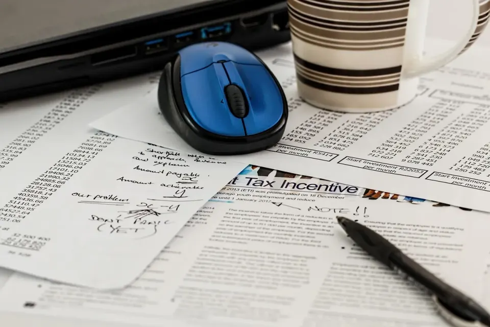 Federal income tax forms laid out on a desk