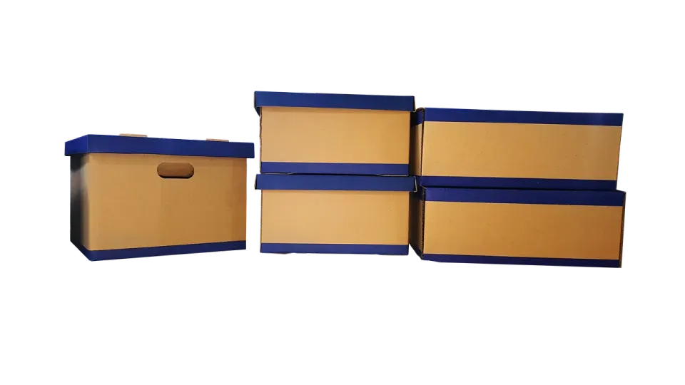 Cardboard moving boxes stacked and taped, ready for a long-distance move